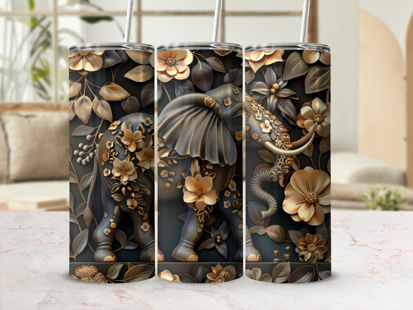 Three tumblers featuring a textured elephant with floral embellishments.