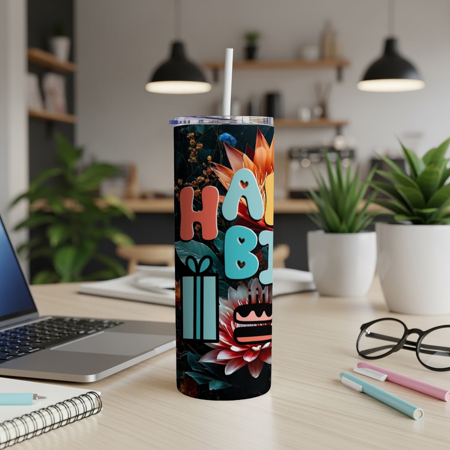 Birthday tumbler with colorful text, gift, and cake illustration.
