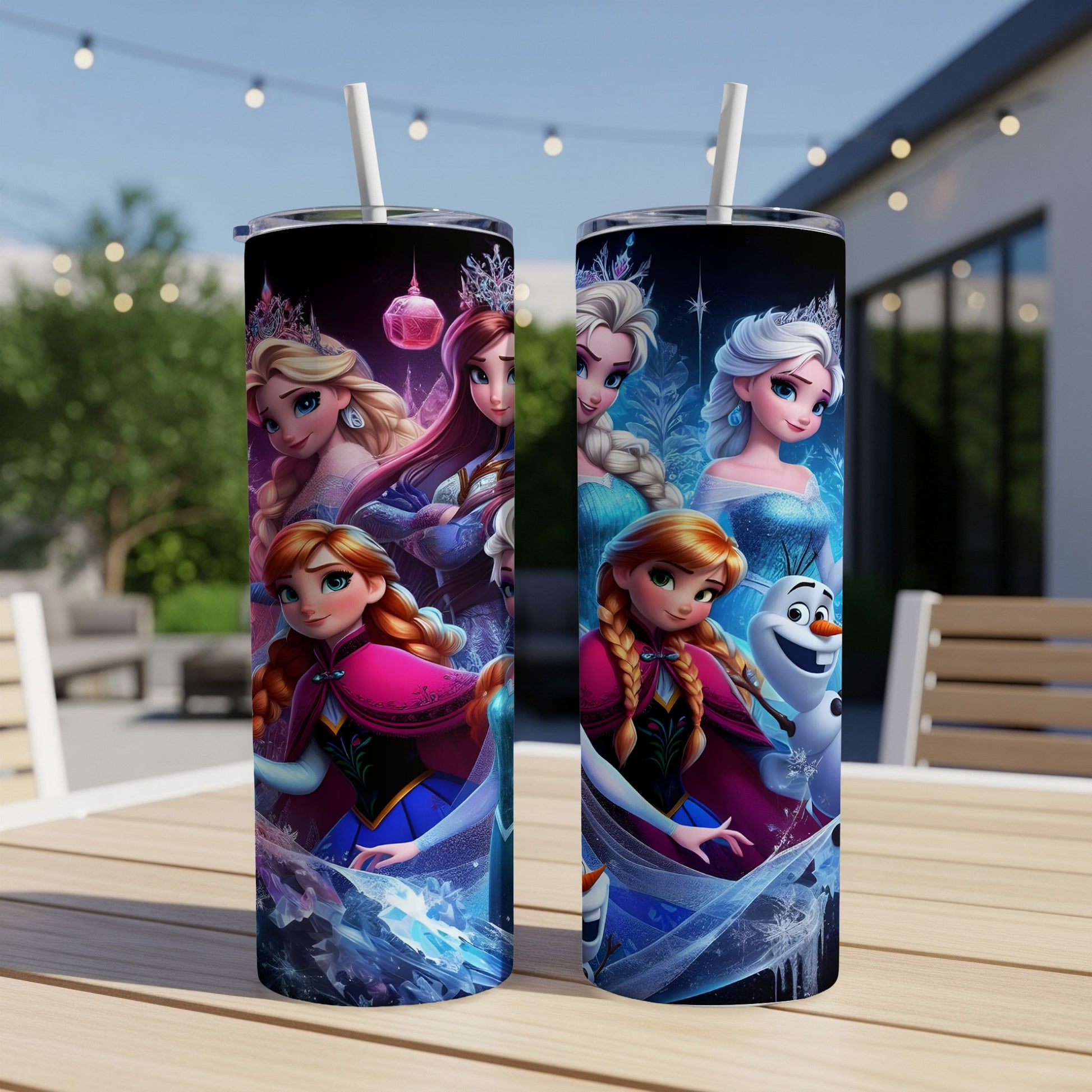 Two Frozen tumblers featuring Elsa, Anna, and Olaf on a table.