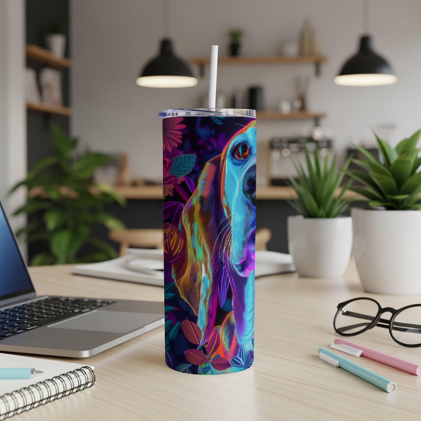 Colorful dog portrait on a skinny tumbler with a straw.