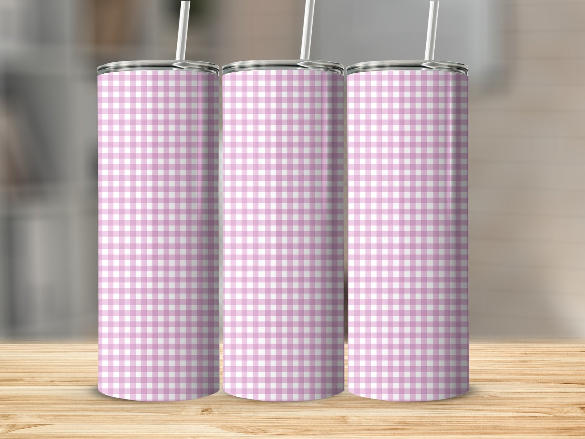 Three tall tumblers with pink and white gingham pattern.