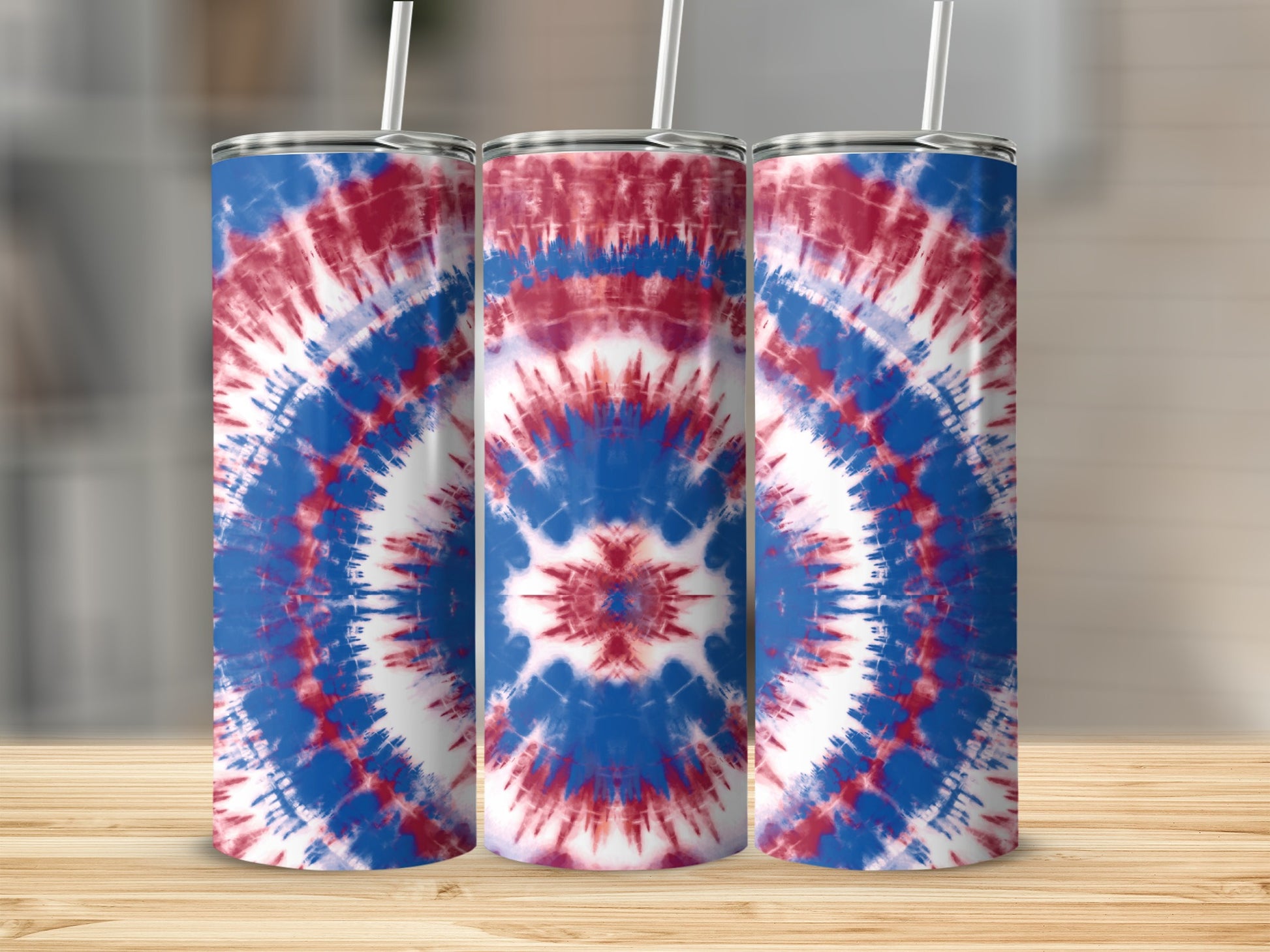 Three tumblers with red, white, and blue tie-dye pattern and straws.
