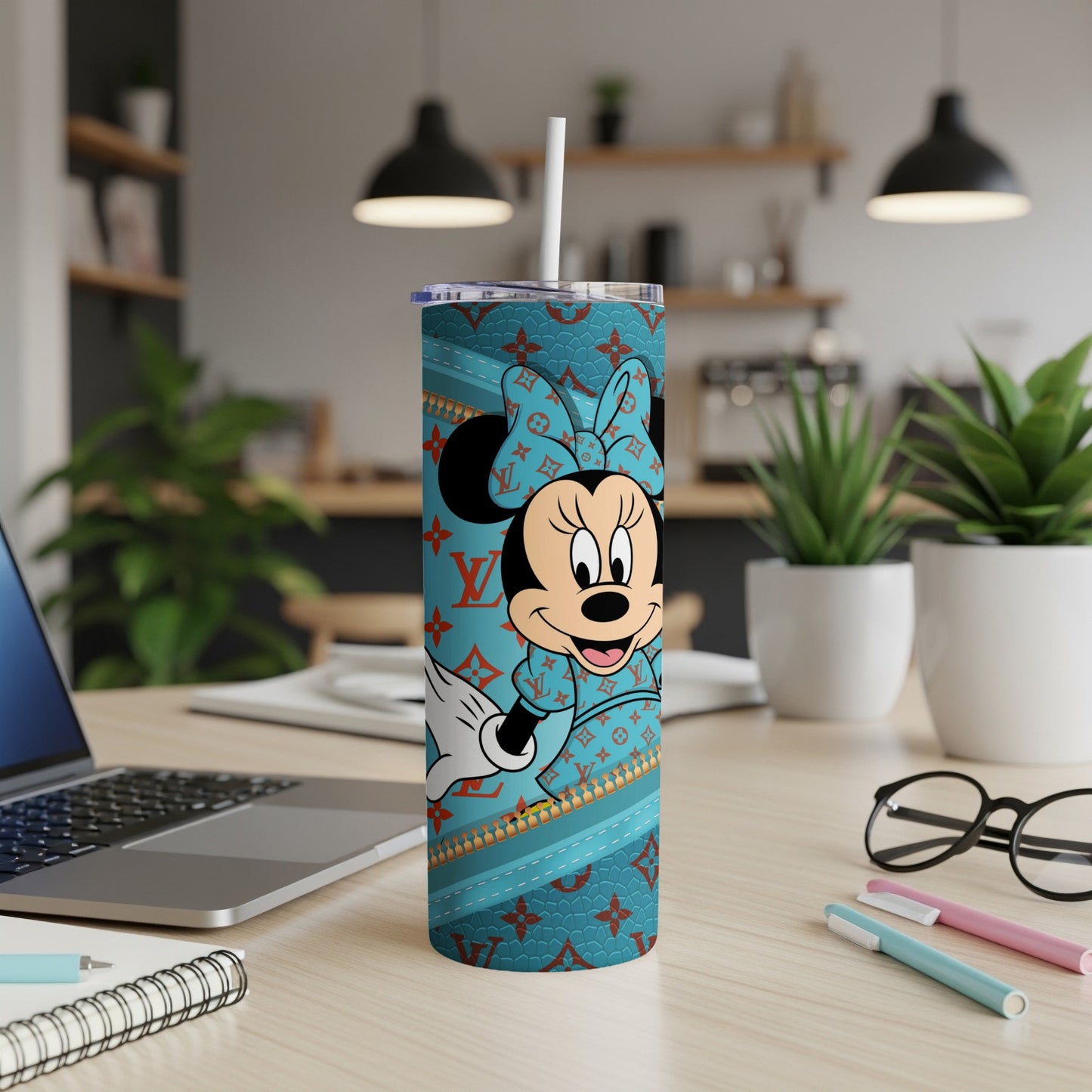 Minnie Mouse on turquoise tumbler with Louis Vuitton-inspired pattern.