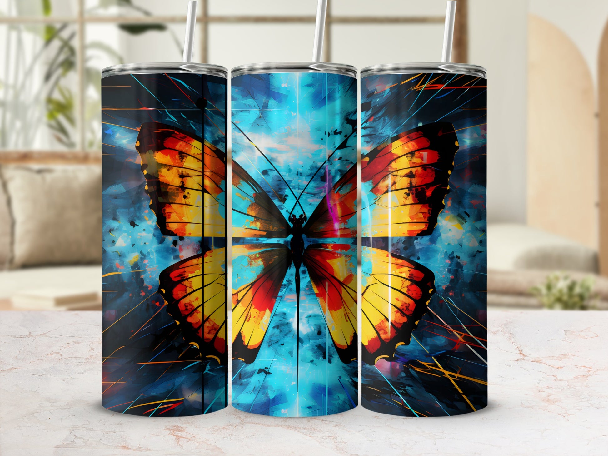 Three tumblers featuring a vibrant butterfly design on a blue, abstract background.