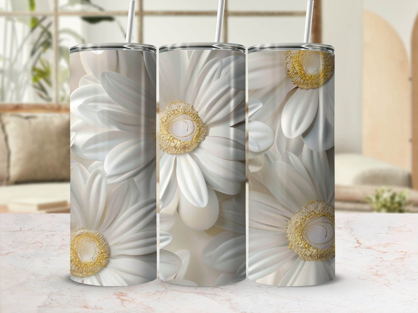 Three stainless steel tumblers with a detailed white daisy floral pattern.