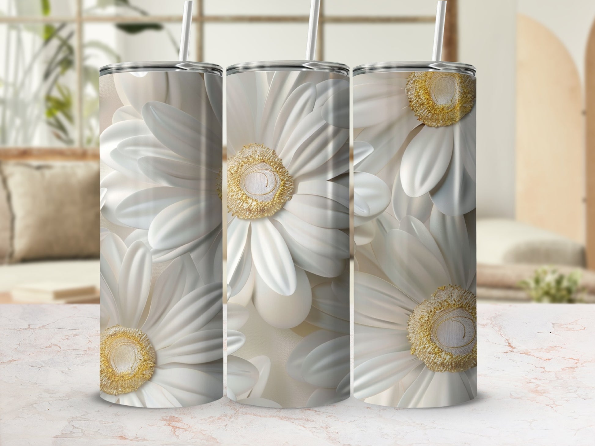 Three stainless steel tumblers with a detailed white daisy floral pattern.