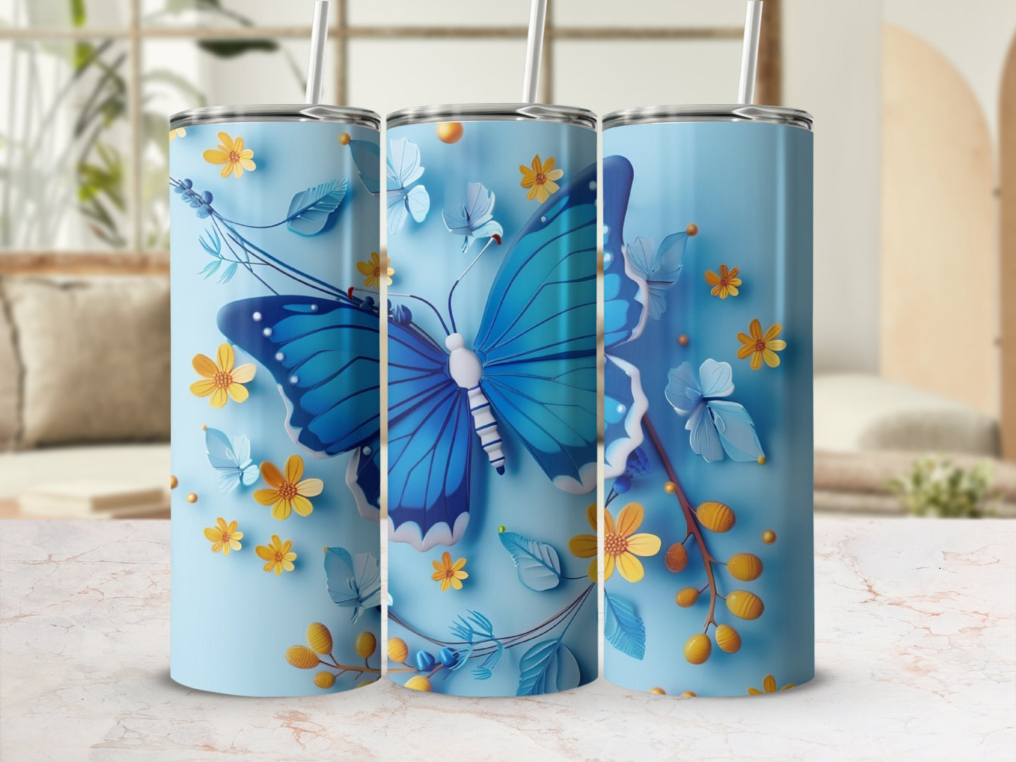 Blue butterfly and floral pattern on a light blue tumbler.