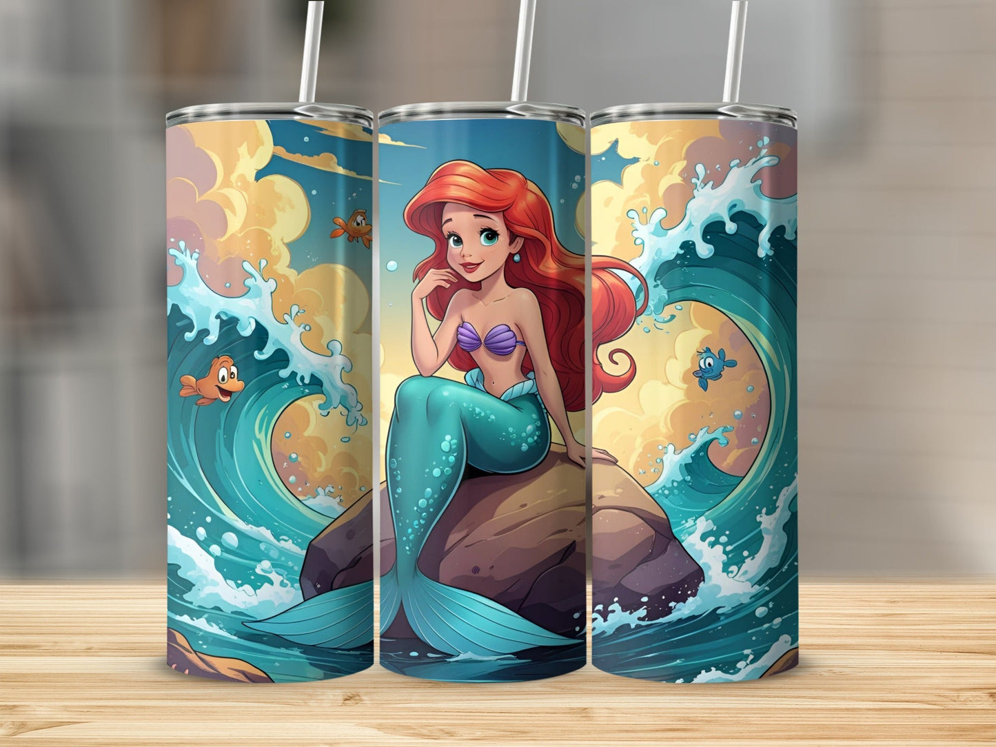 Ariel the mermaid sits on a rock surrounded by waves and fish.