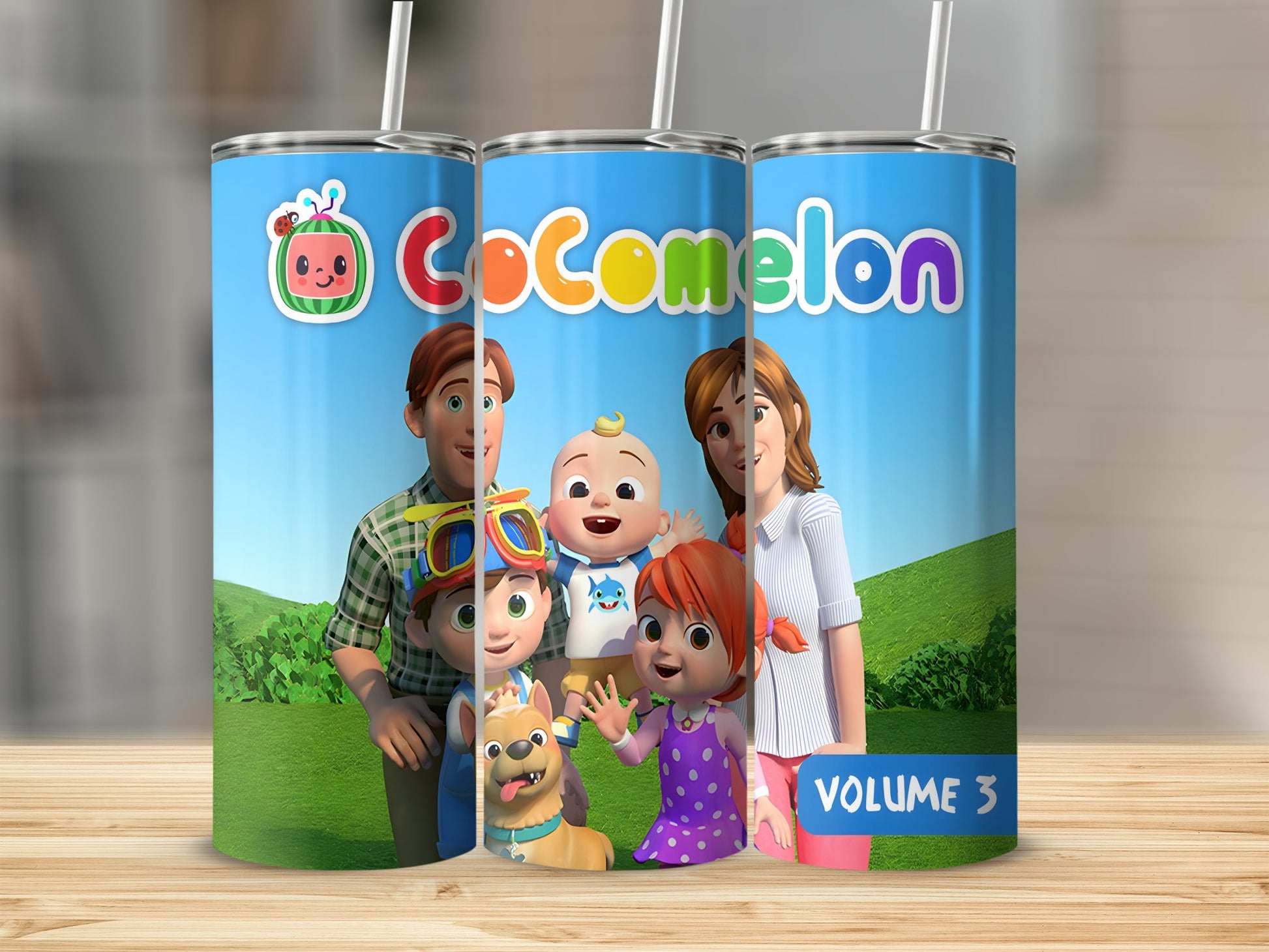 Cocomelon tumbler with cartoon family and dog, Volume 3 label.