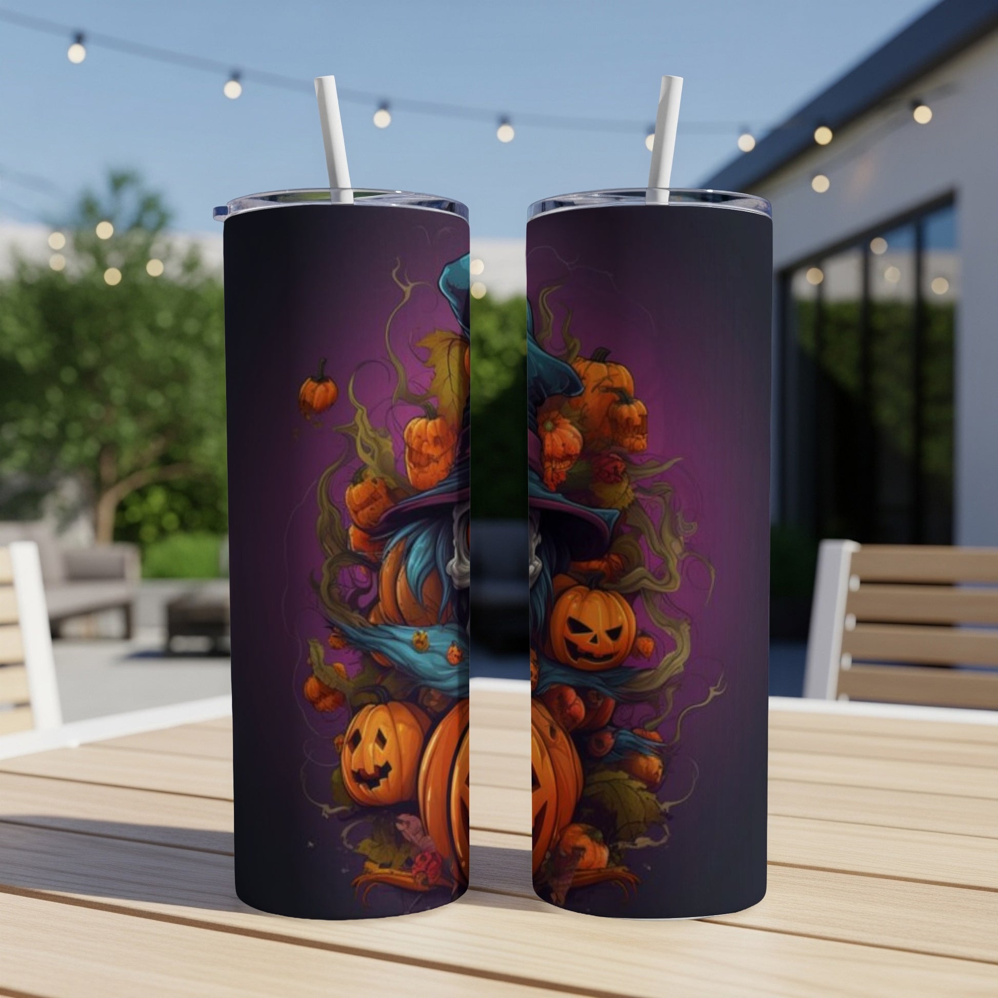 Two tumblers with Halloween-themed artwork featuring a witch and pumpkins.