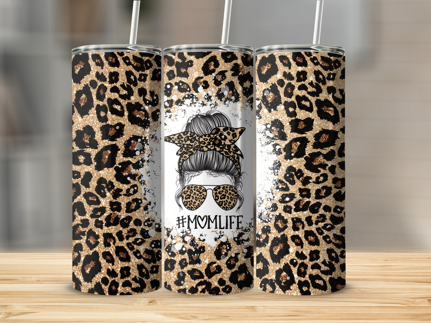 Leopard print tumbler with "Mom Life" and messy bun design.