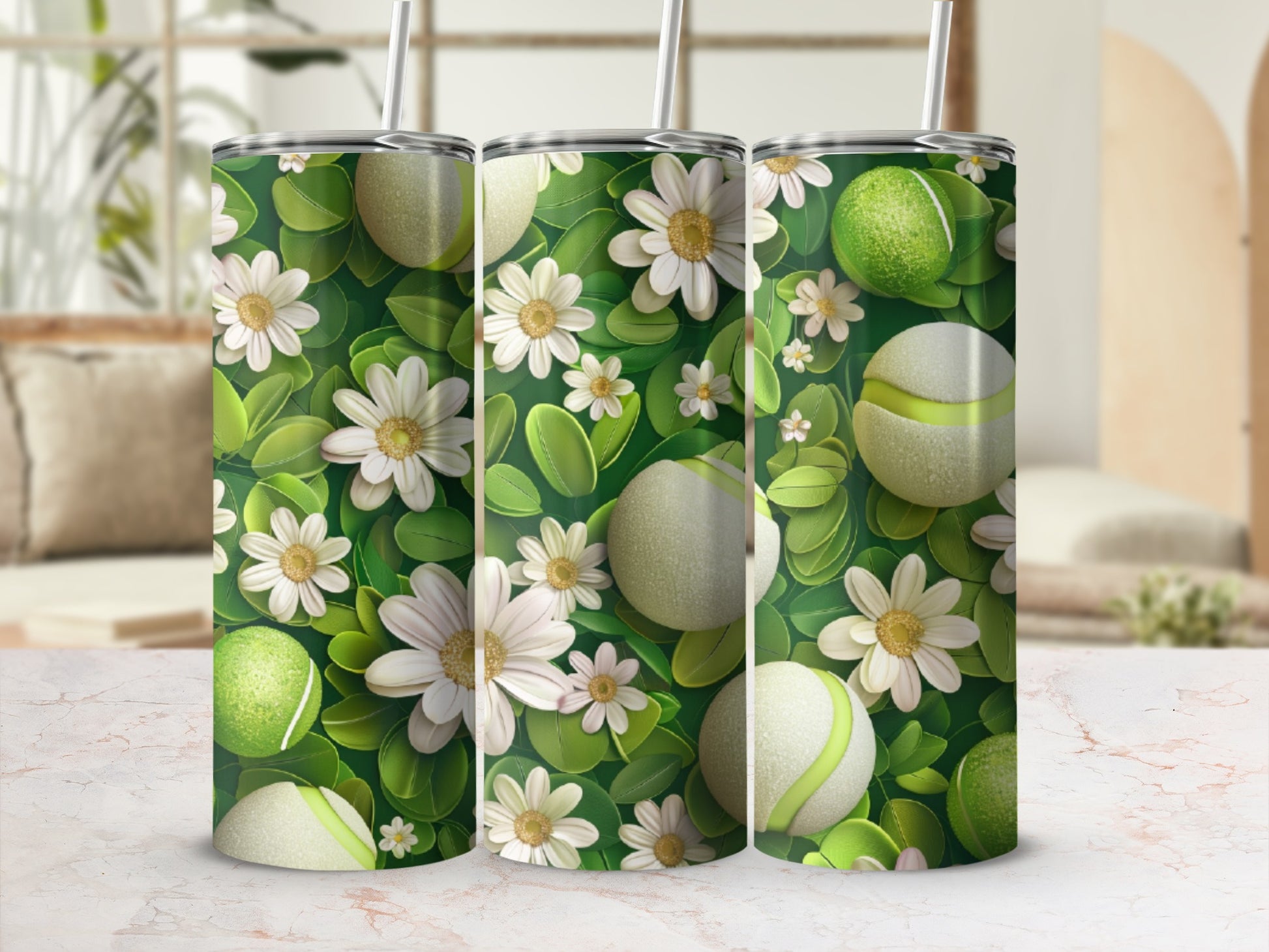 Green tumbler with white daisies and tennis balls.