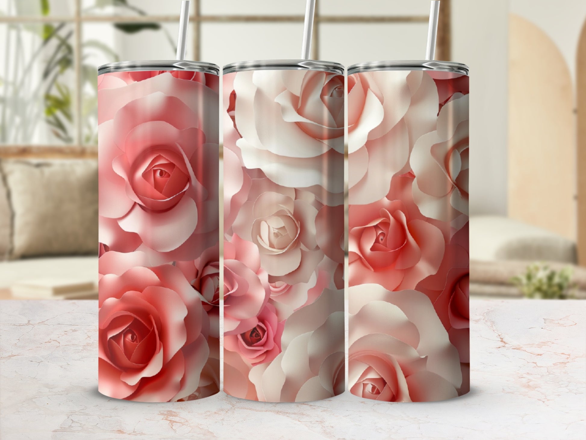 Three tall tumblers with a pink and white rose floral pattern.
