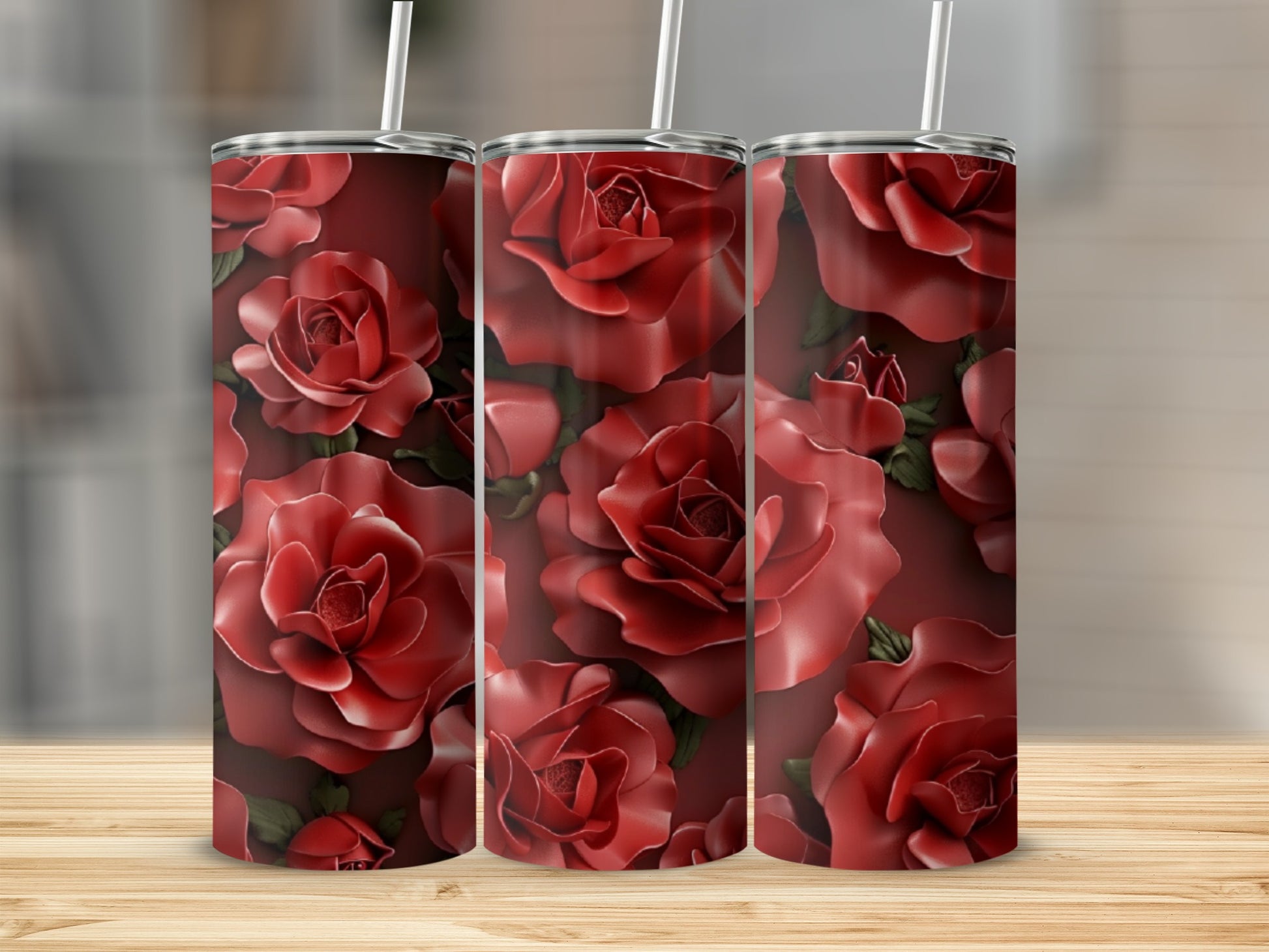 Three tumblers featuring a repeating pattern of deep red roses.