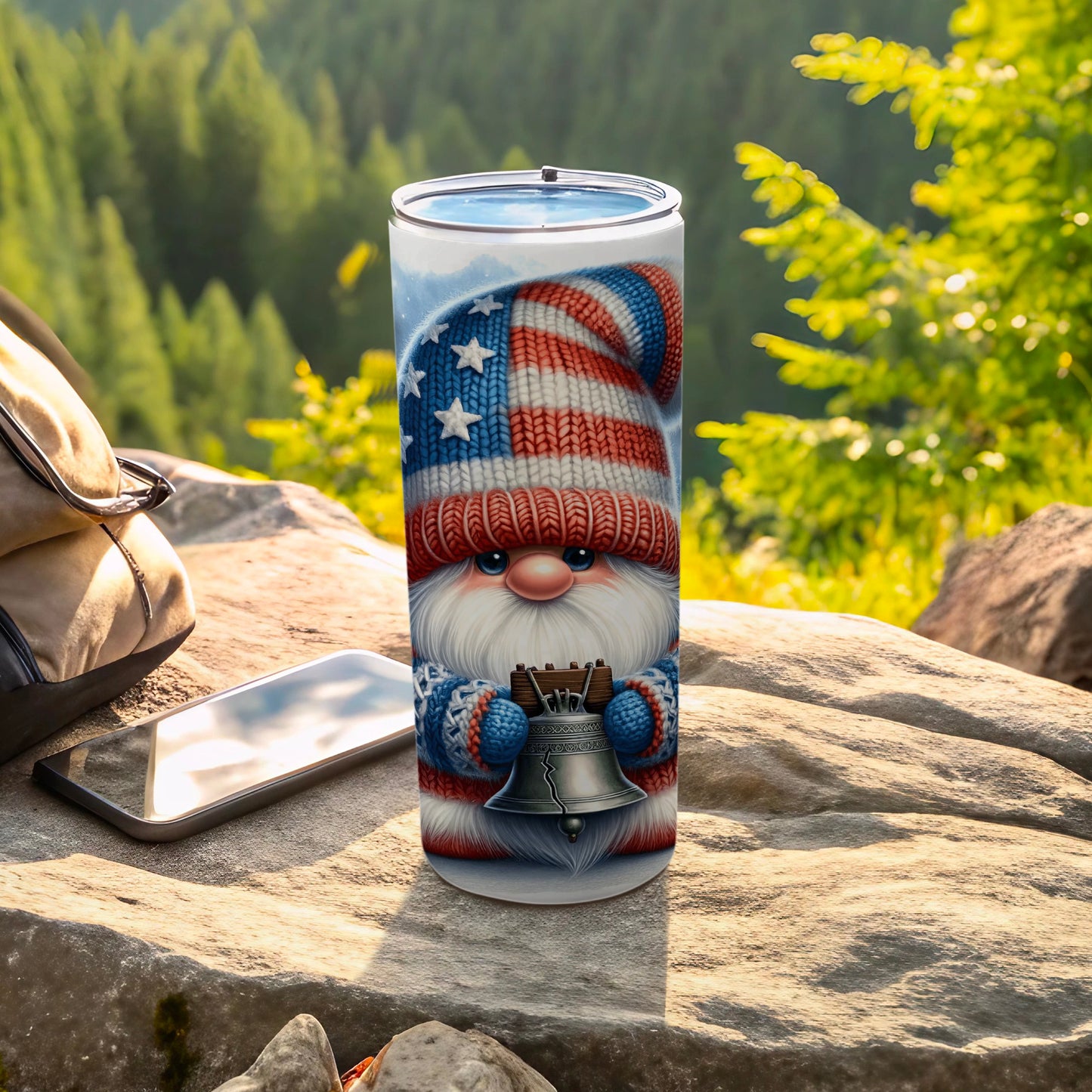 Gnome wearing patriotic hat and sweater holding bell, outdoor scene.