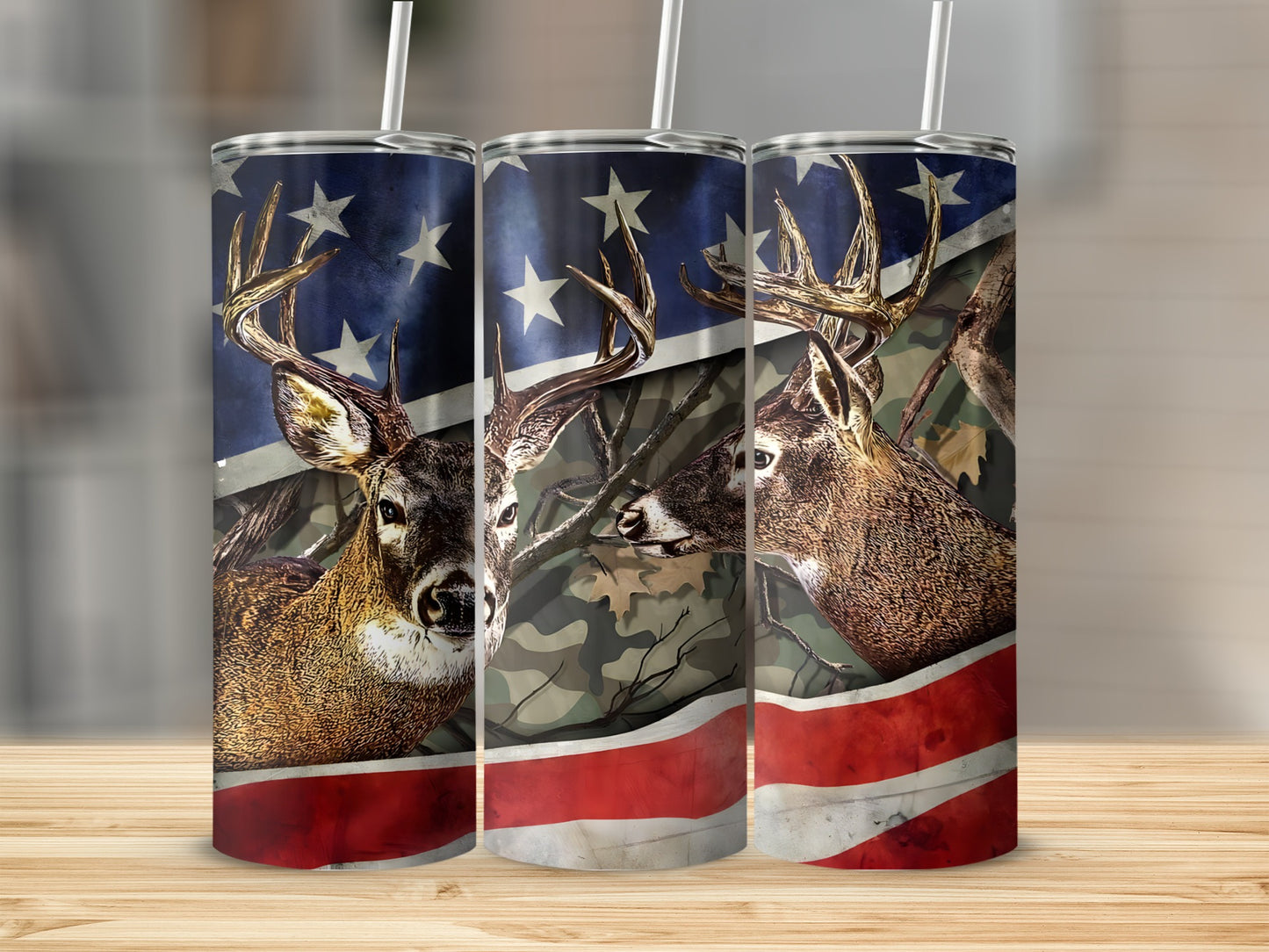 Two deer heads with antlers on tumblers with American flag and camouflage design.