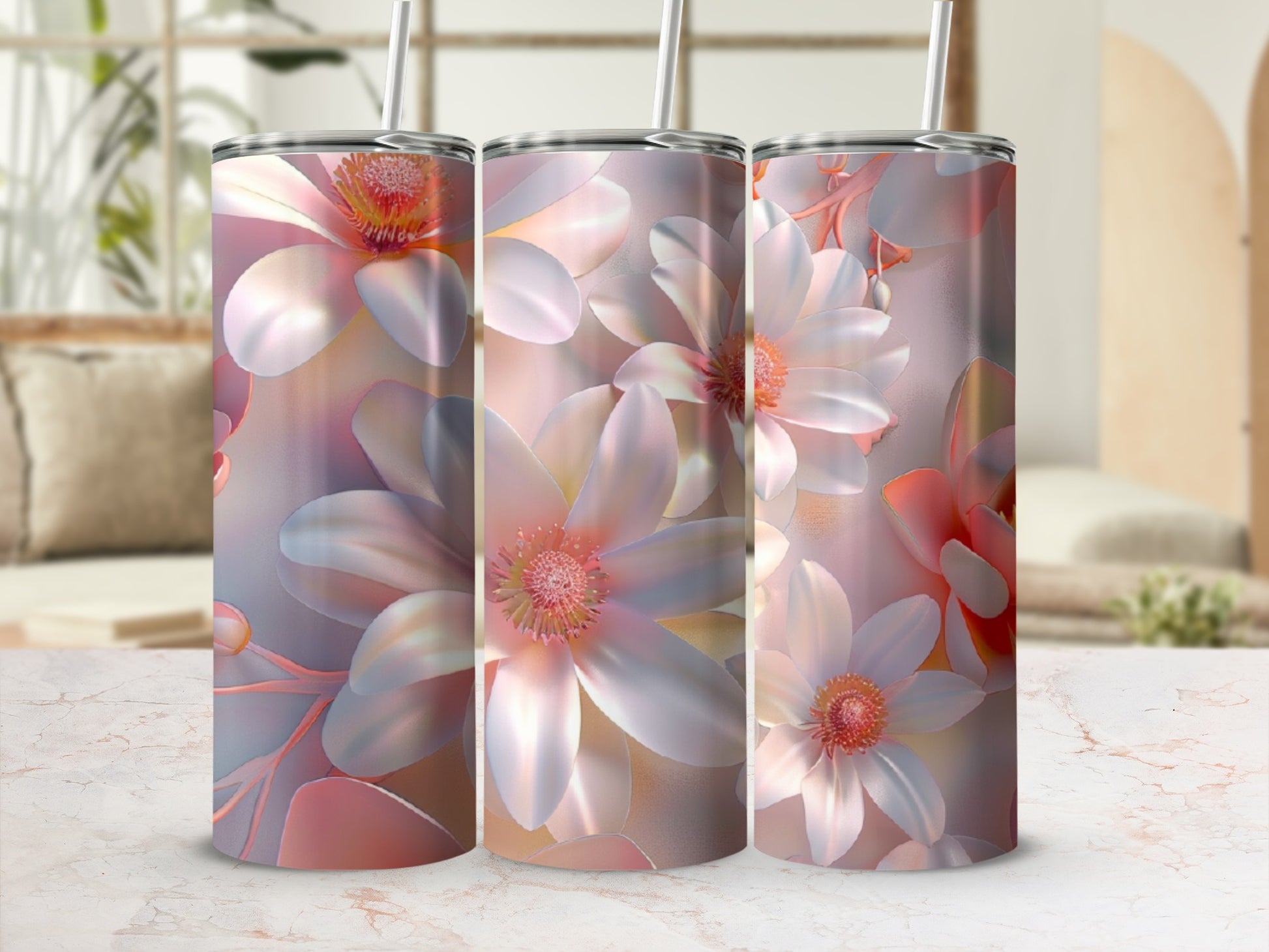 Three tumblers with a floral design in shades of pink and white.