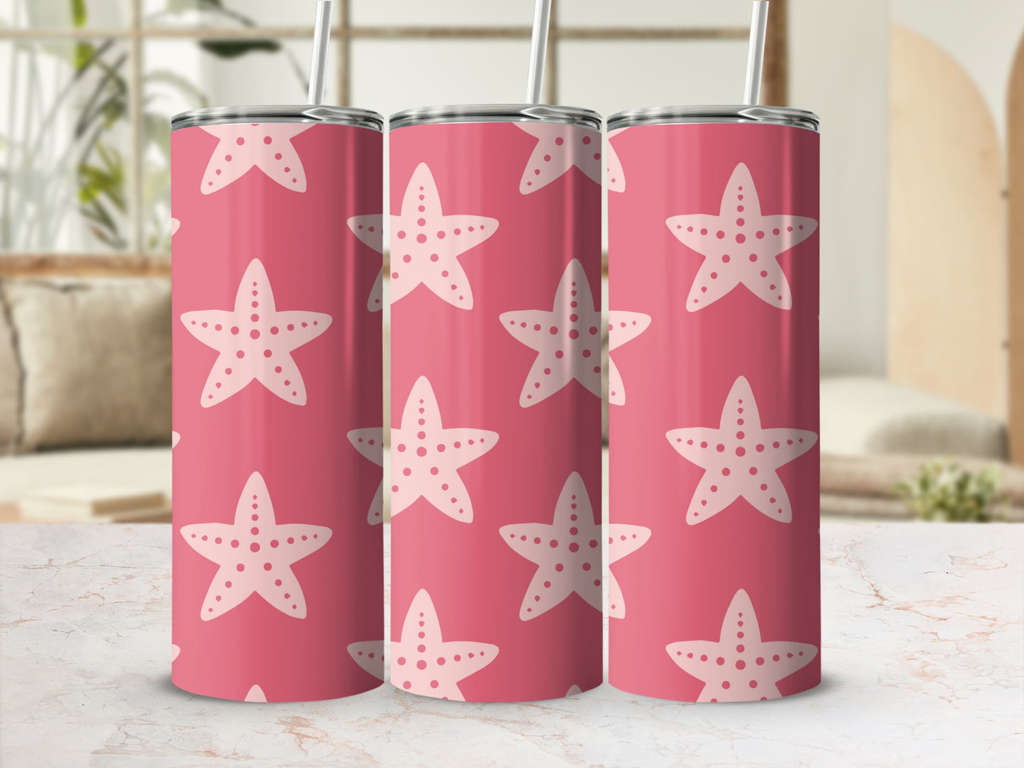 Pink tumbler with repeating white starfish pattern.