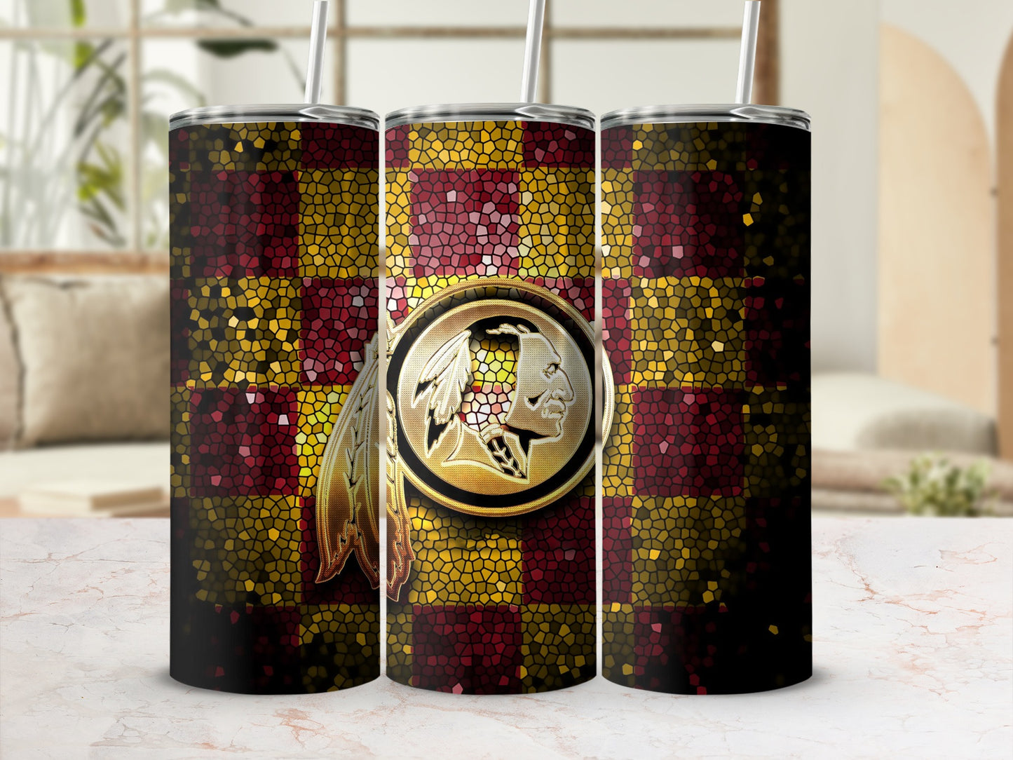 Three tumblers featuring a Redskins logo and a mosaic checkerboard pattern.