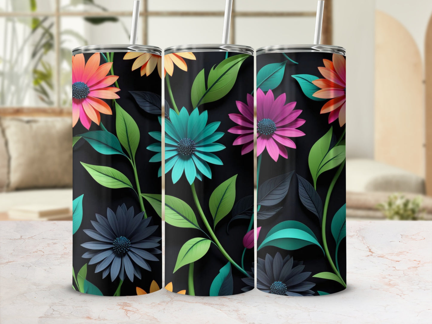 Three tumblers with dark backgrounds and colorful floral and leaf designs.