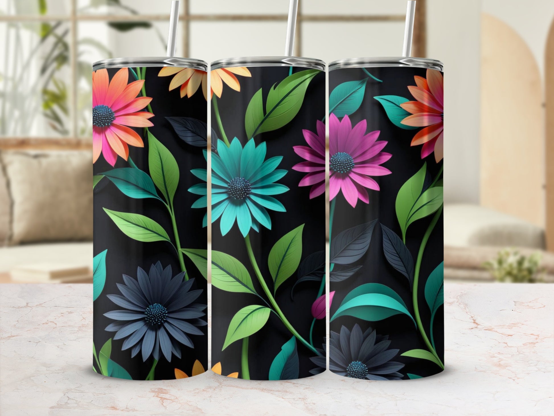 Three tumblers with dark backgrounds and colorful floral and leaf designs.