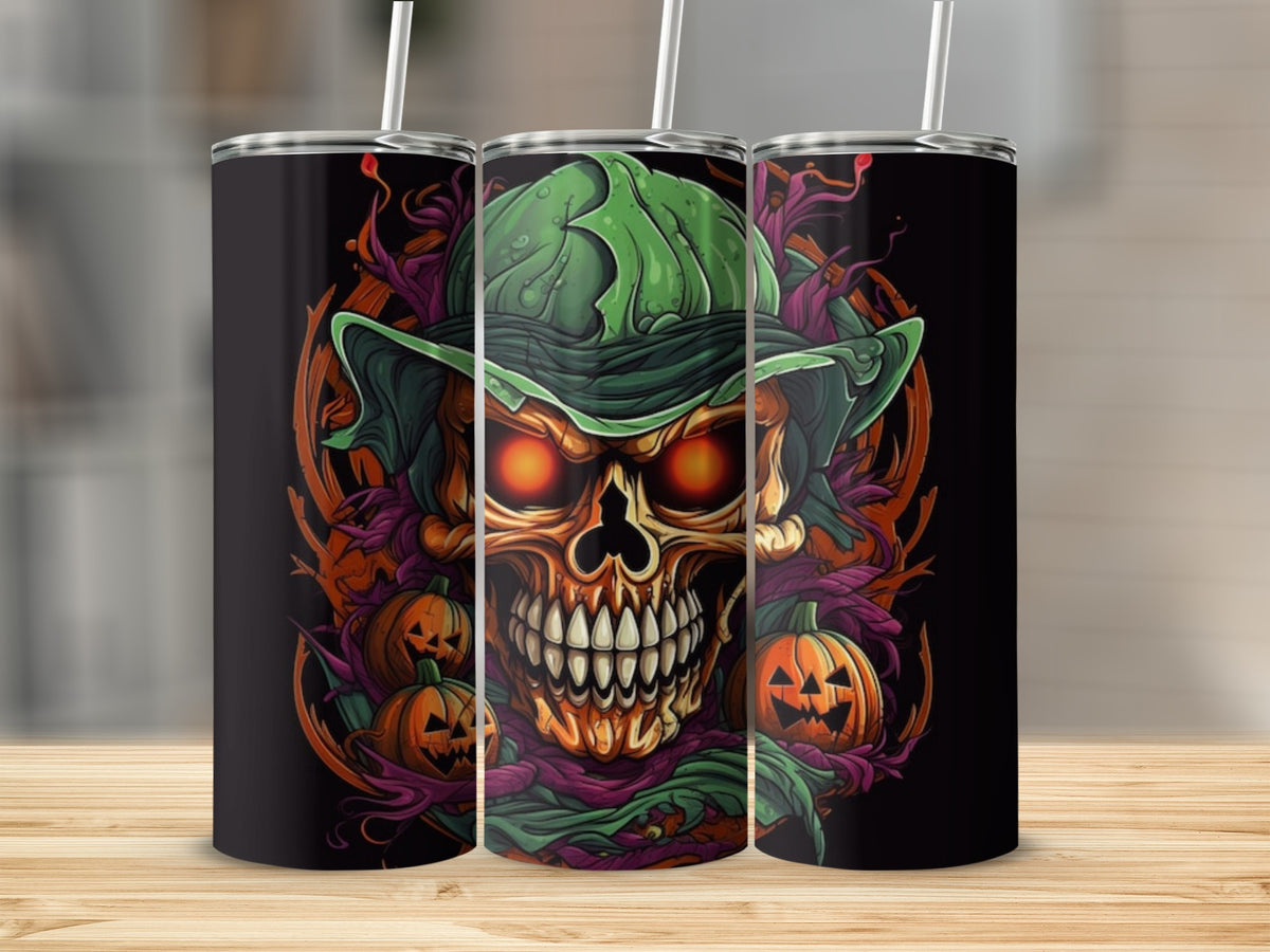 Three tumblers featuring a Halloween-themed skull with glowing eyes and pumpkins.