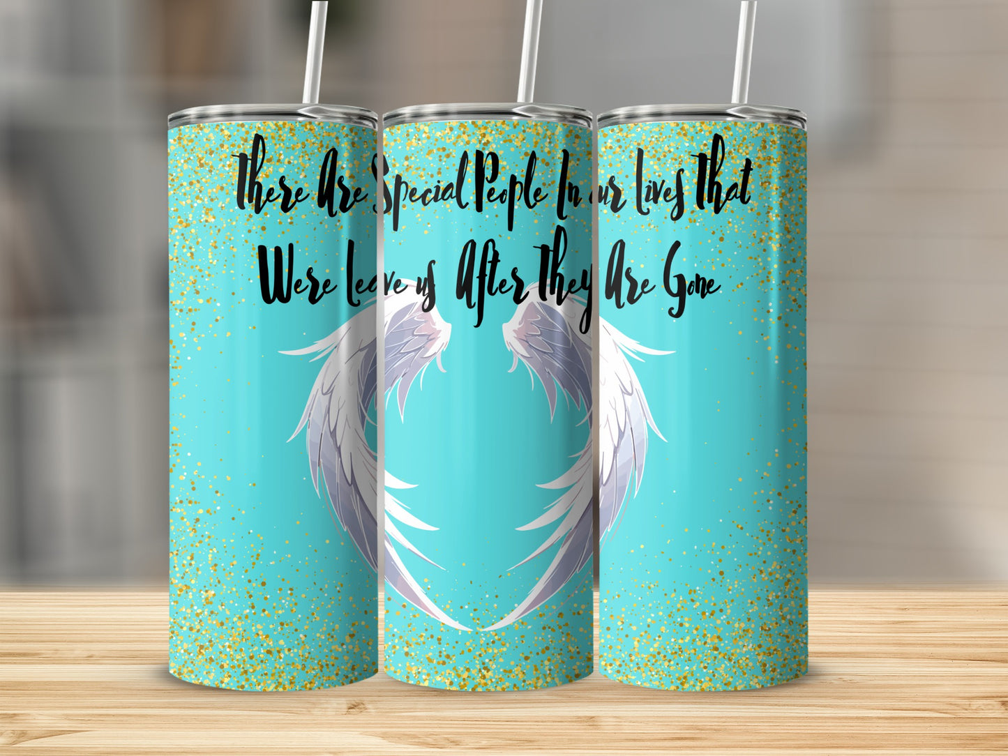 Turquoise tumbler with angel wings and glitter, featuring memorial text.