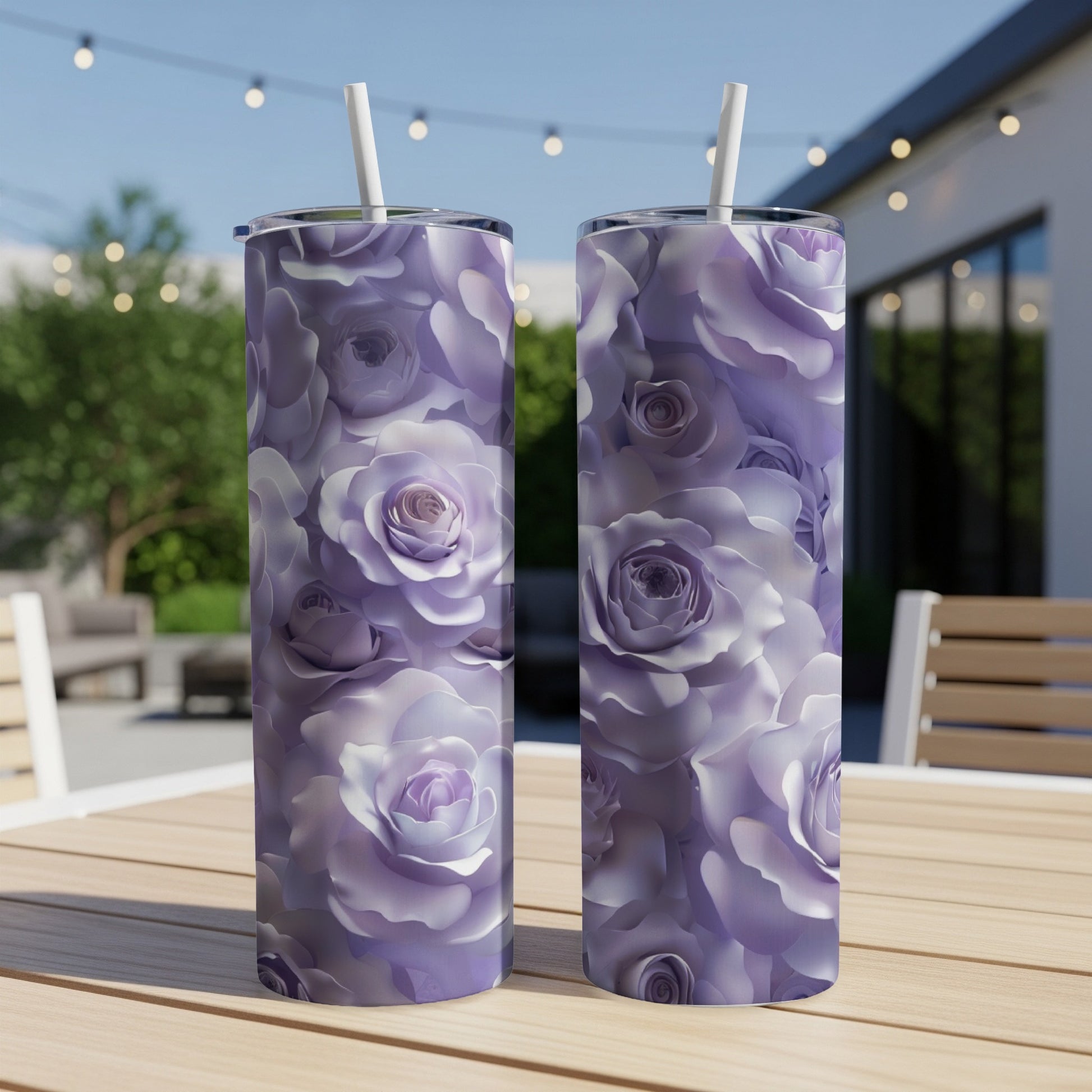 Two tall tumblers with a pattern of purple and white roses.
