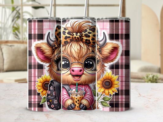 Cute cow with glasses and bow holding a drink, wearing a pink plaid shirt.
