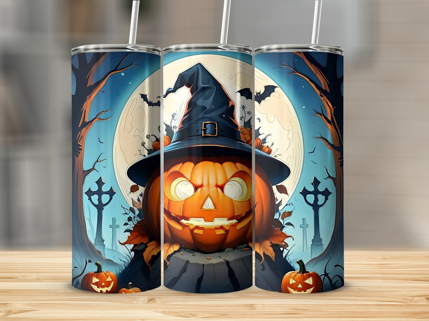 Tumbler with Halloween pumpkin, witch hat, moon, bats, and gravestones.