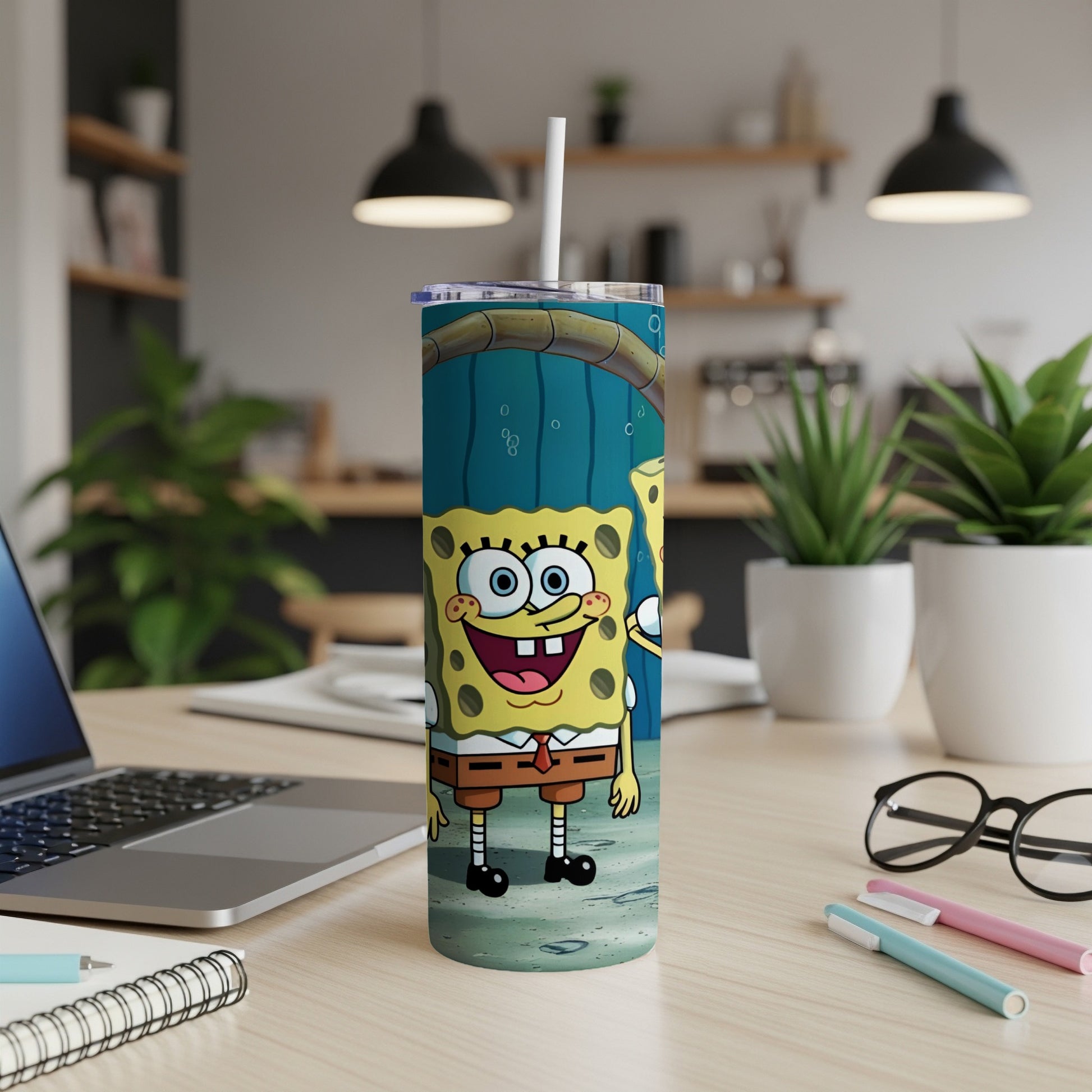 SpongeBob SquarePants character design on a skinny tumbler with a straw.
