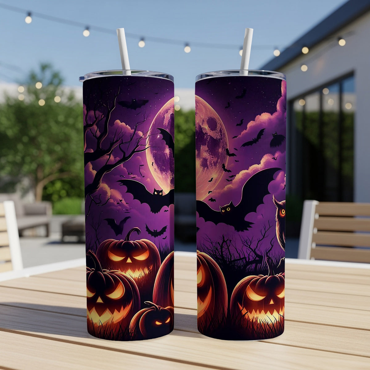 Halloween tumblers with jack-o'-lanterns, bats, and a full moon.