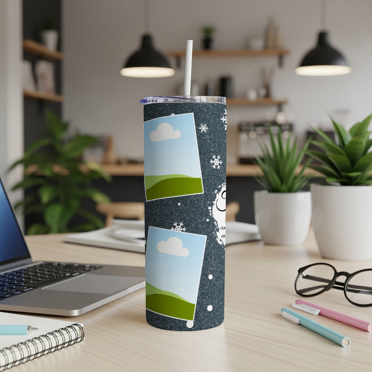 Tumbler with two photo frames, snowflakes, and text on a dark speckled background.