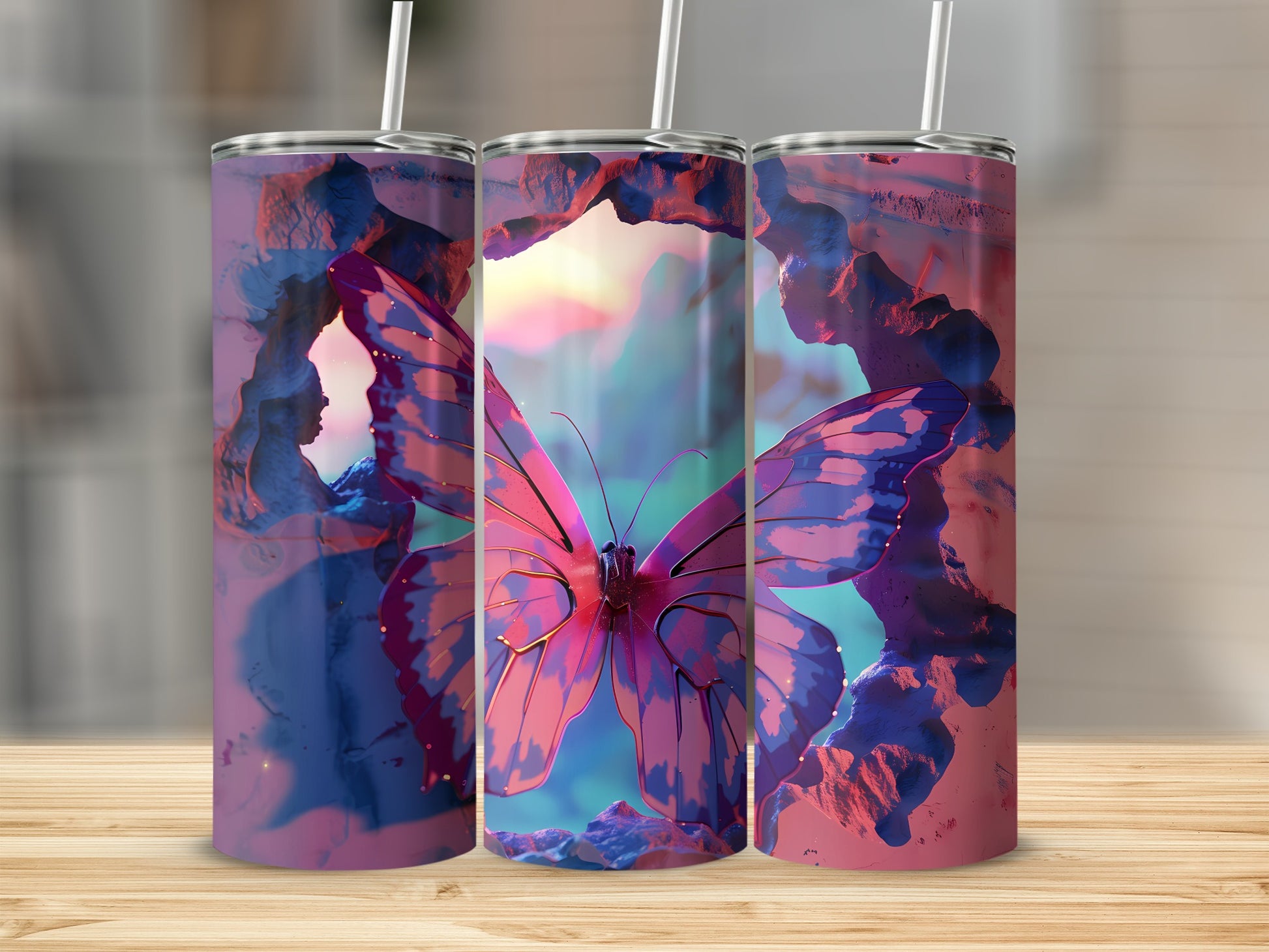 Three tumblers with a pink butterfly and purple abstract design.