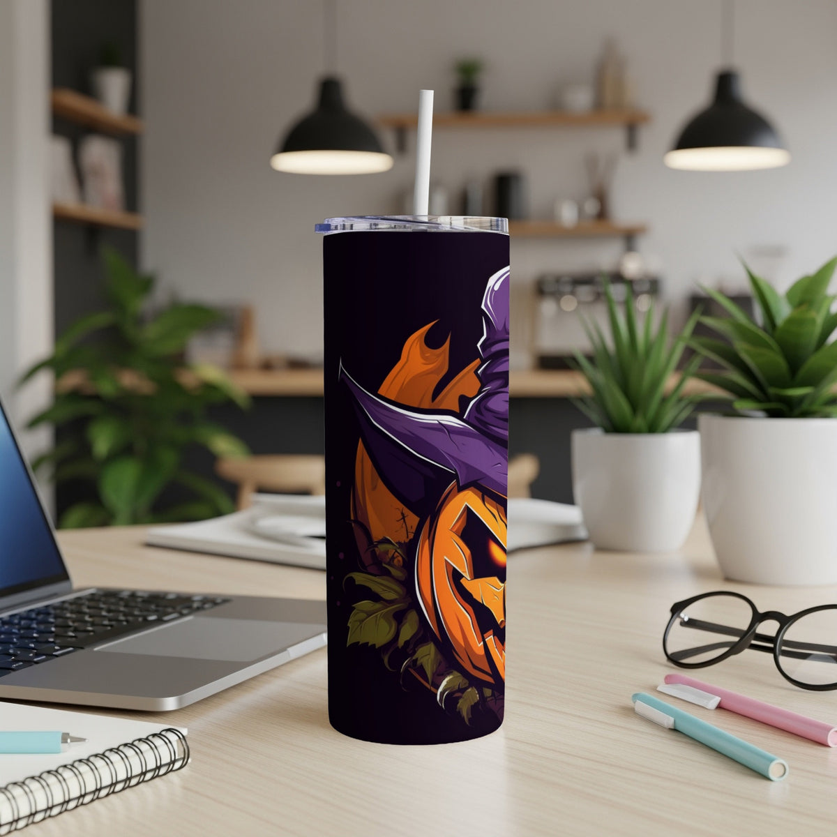 Tumbler with a spooky jack-o'-lantern wearing a witch hat and flames.