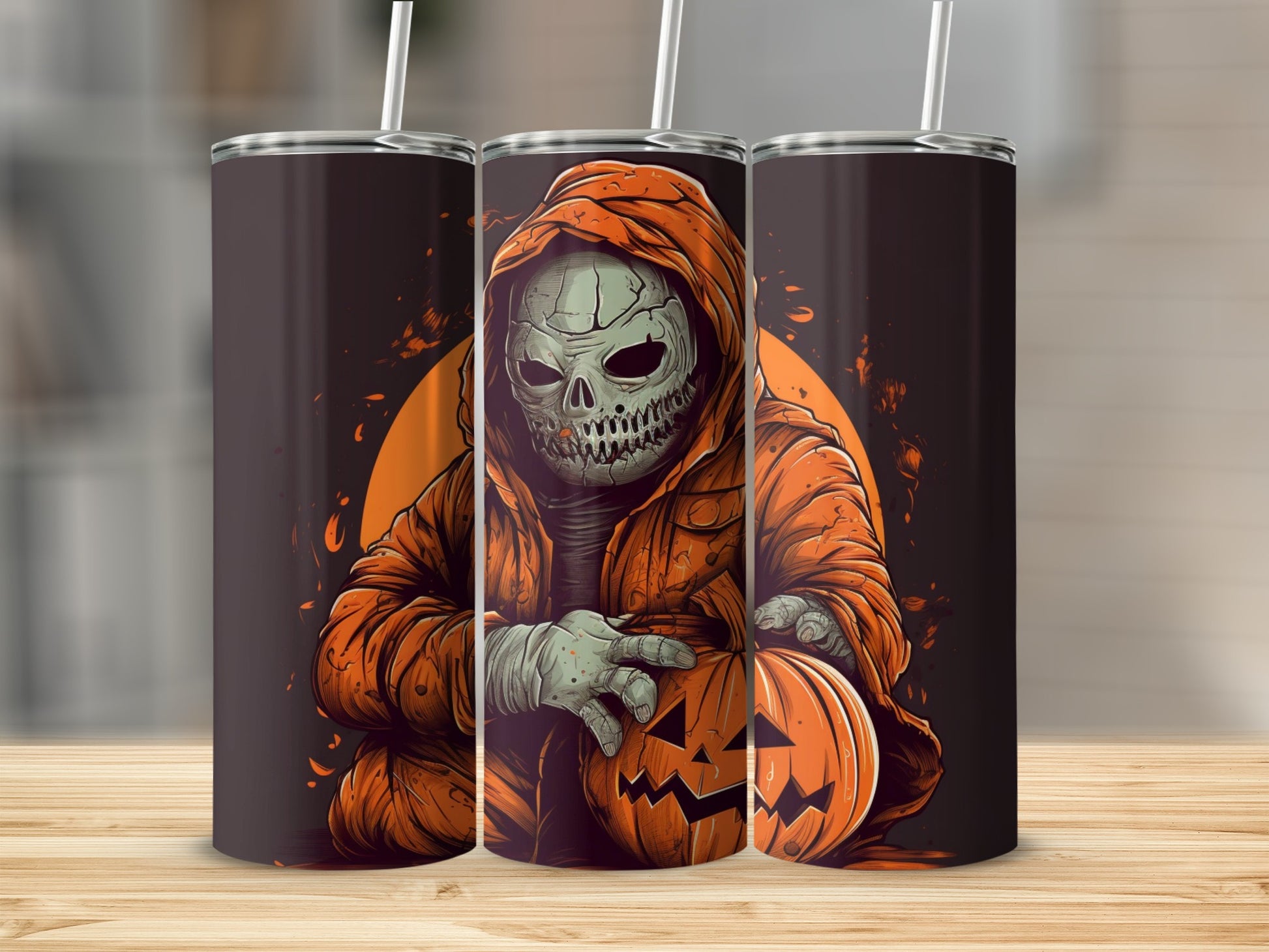 Skull in orange hoodie holding a jack-o-lantern on Halloween themed tumblers.