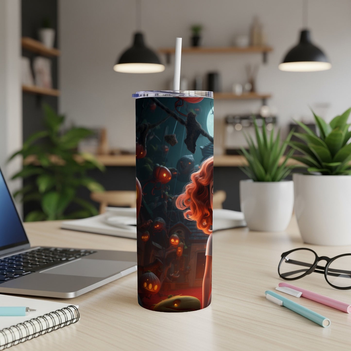 Tumbler with Halloween illustration of glowing pumpkins, monsters, and a girl with red hair.