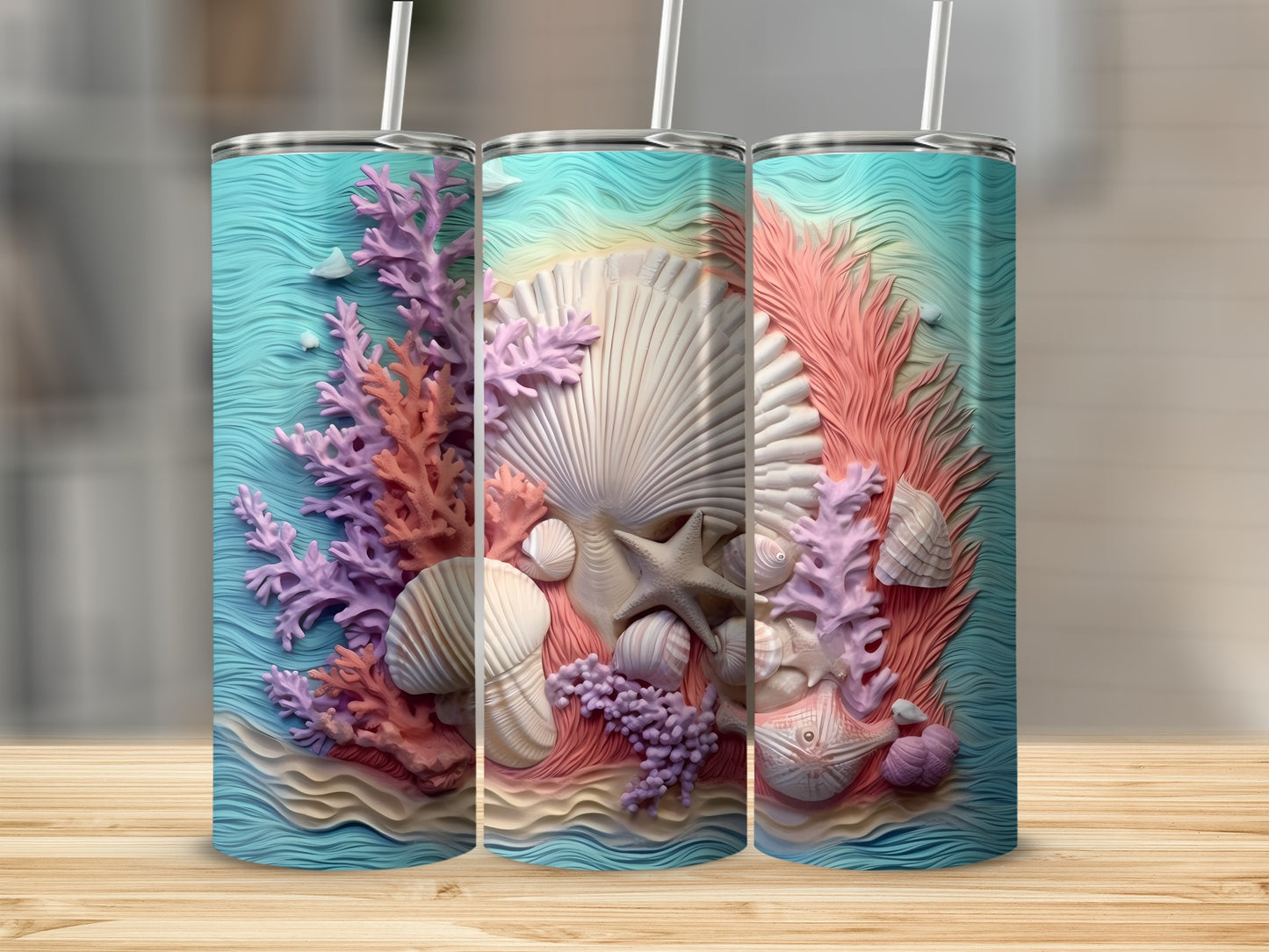 Beach seashell and coral design on three tumblers.