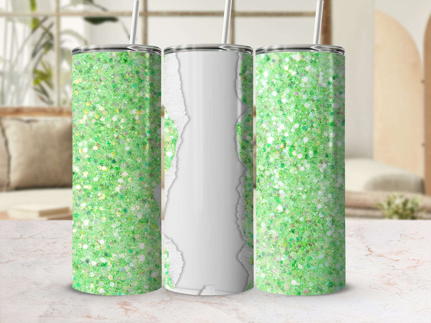 Three glitter tumblers with straw, one with torn paper detail.