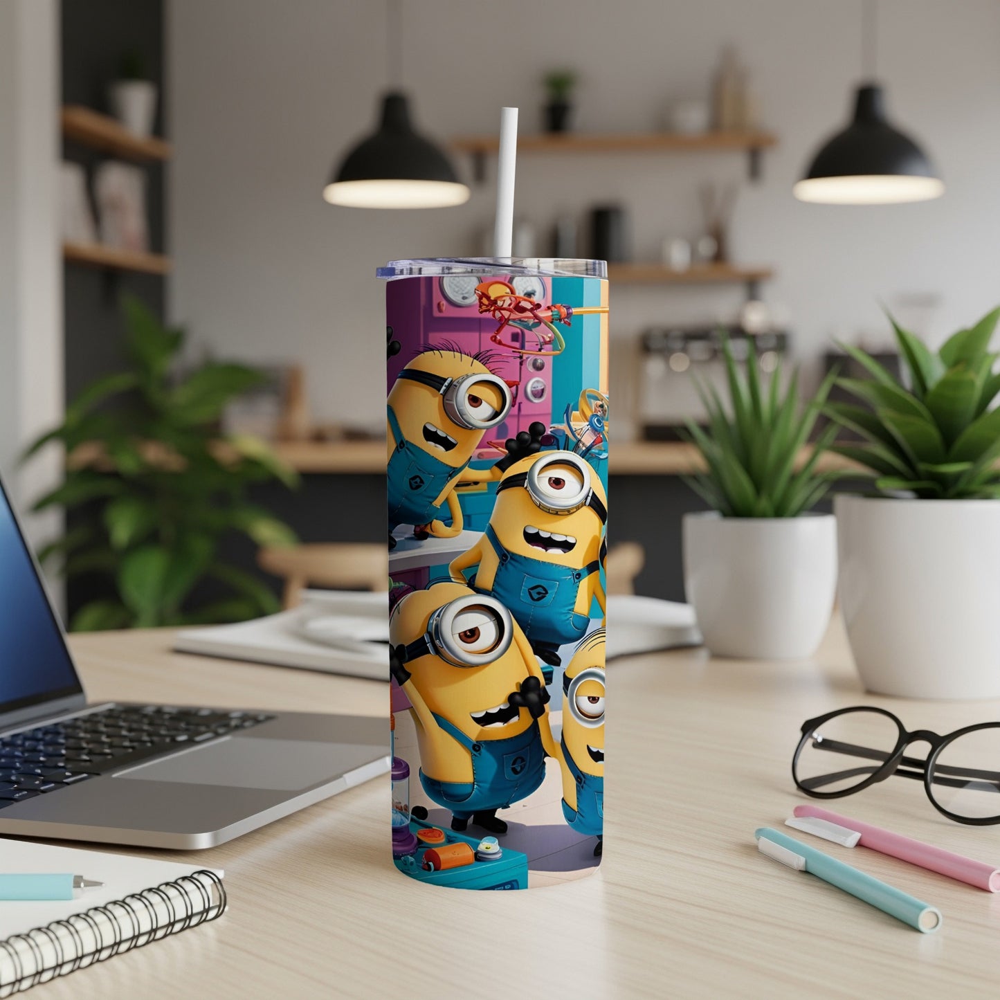 Minions characters on a purple background, presented on a tall tumbler with a straw.