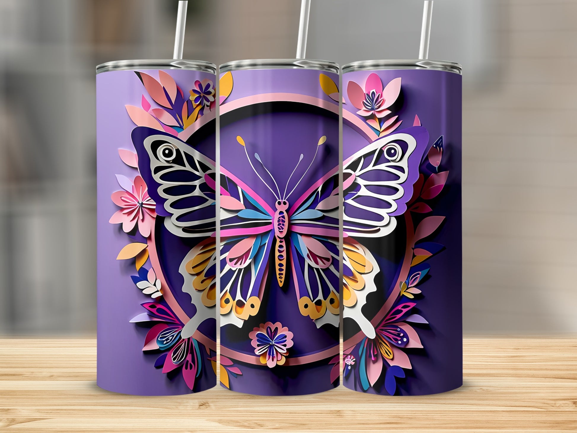 Three purple tumblers with colorful butterfly and floral papercraft designs.