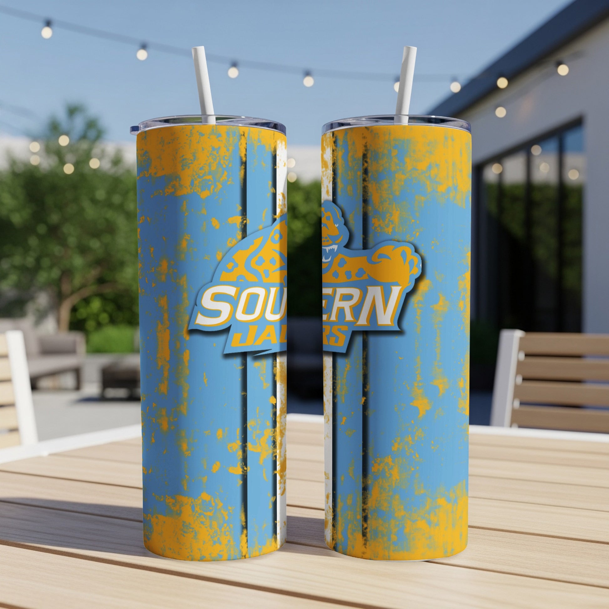 Two tumblers with blue, orange, and white "Southern Jaguars" logo.