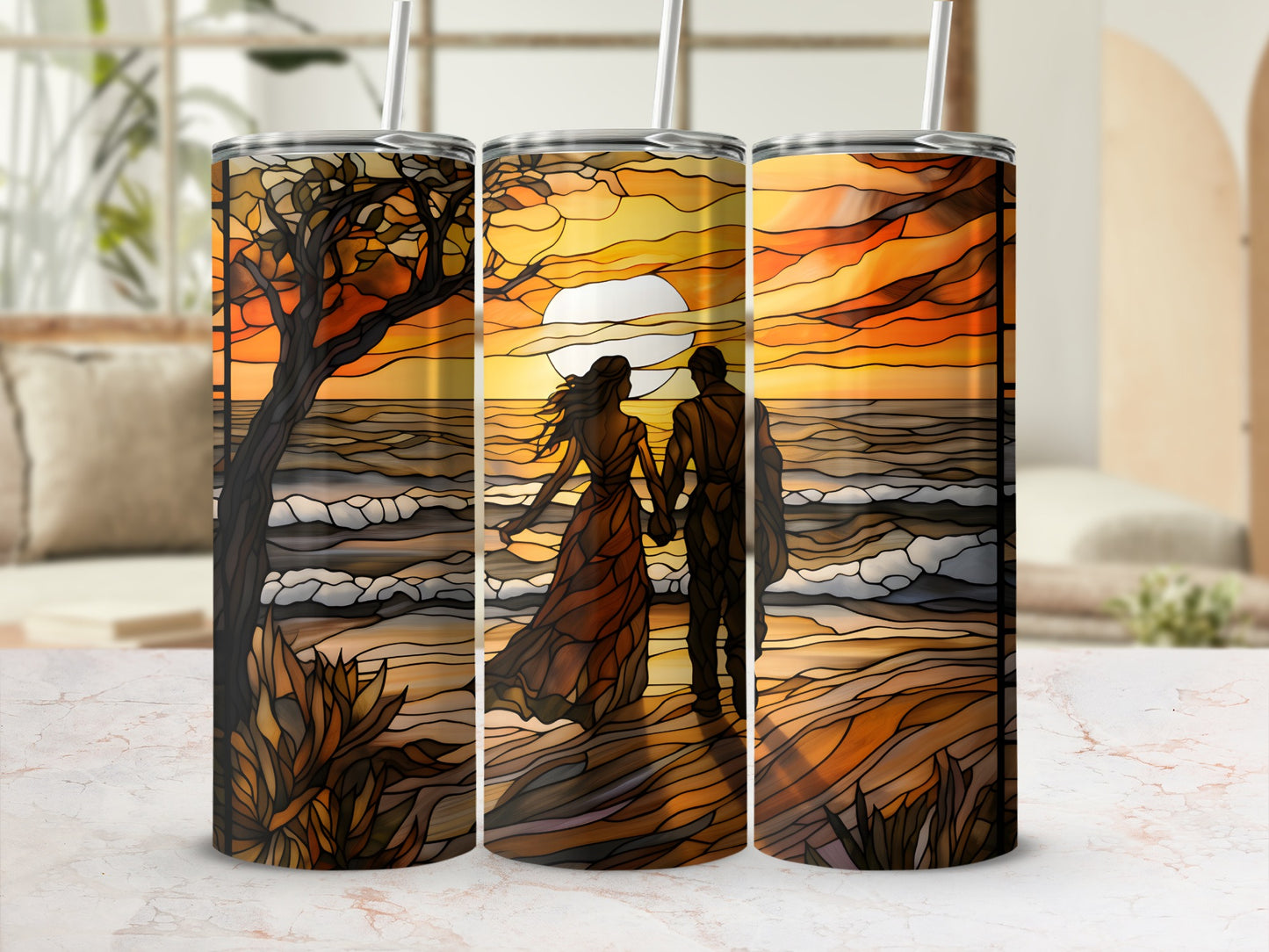 Couple walking on beach at sunset, stained glass design on tumblers.