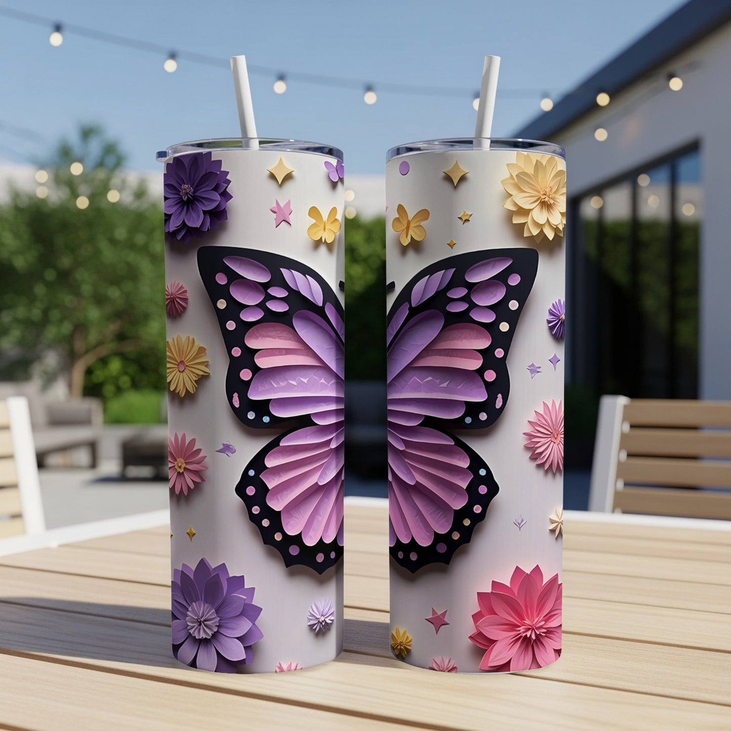 Two tumblers decorated with purple and pink butterflies and flowers.