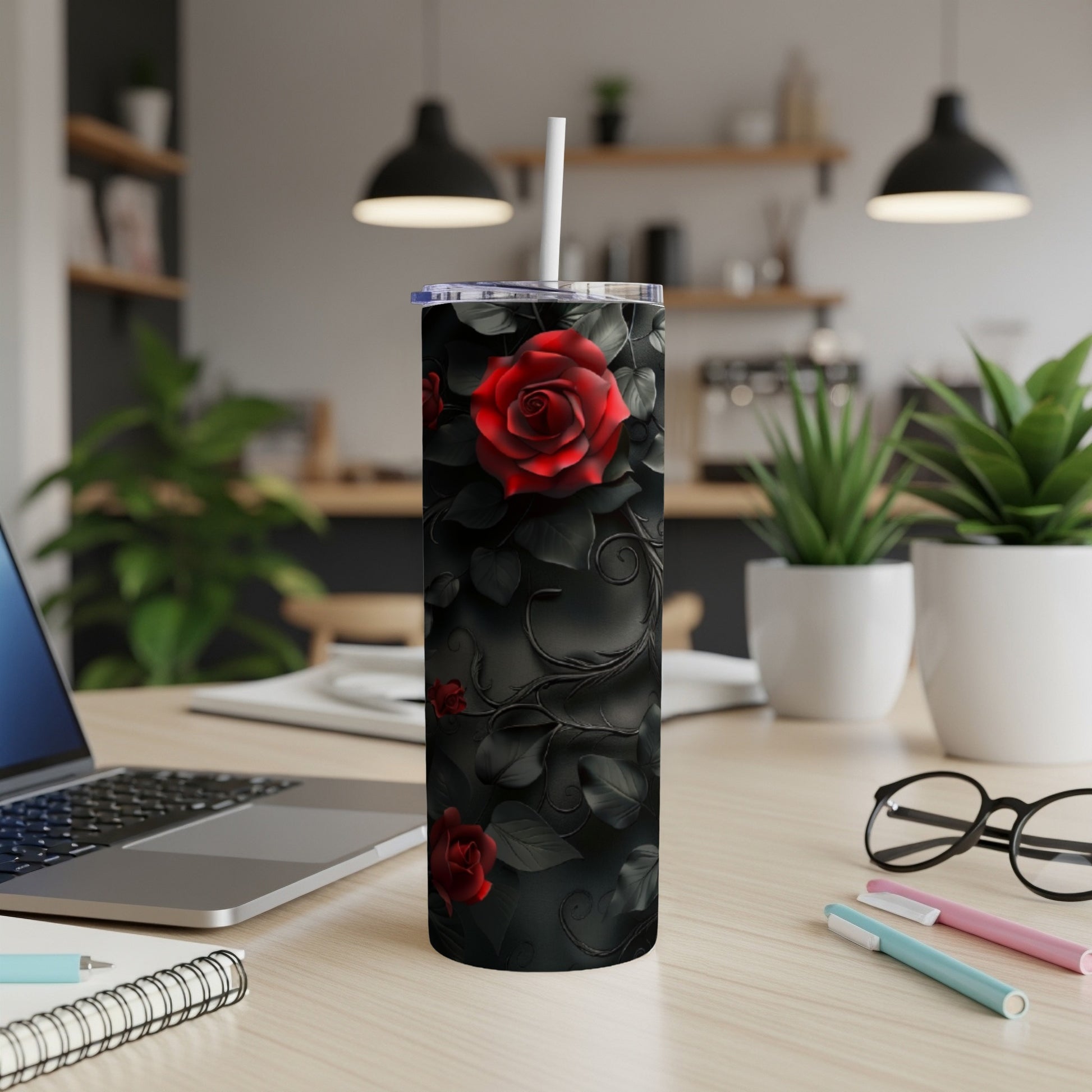 Black tumbler with red roses and floral vine design.