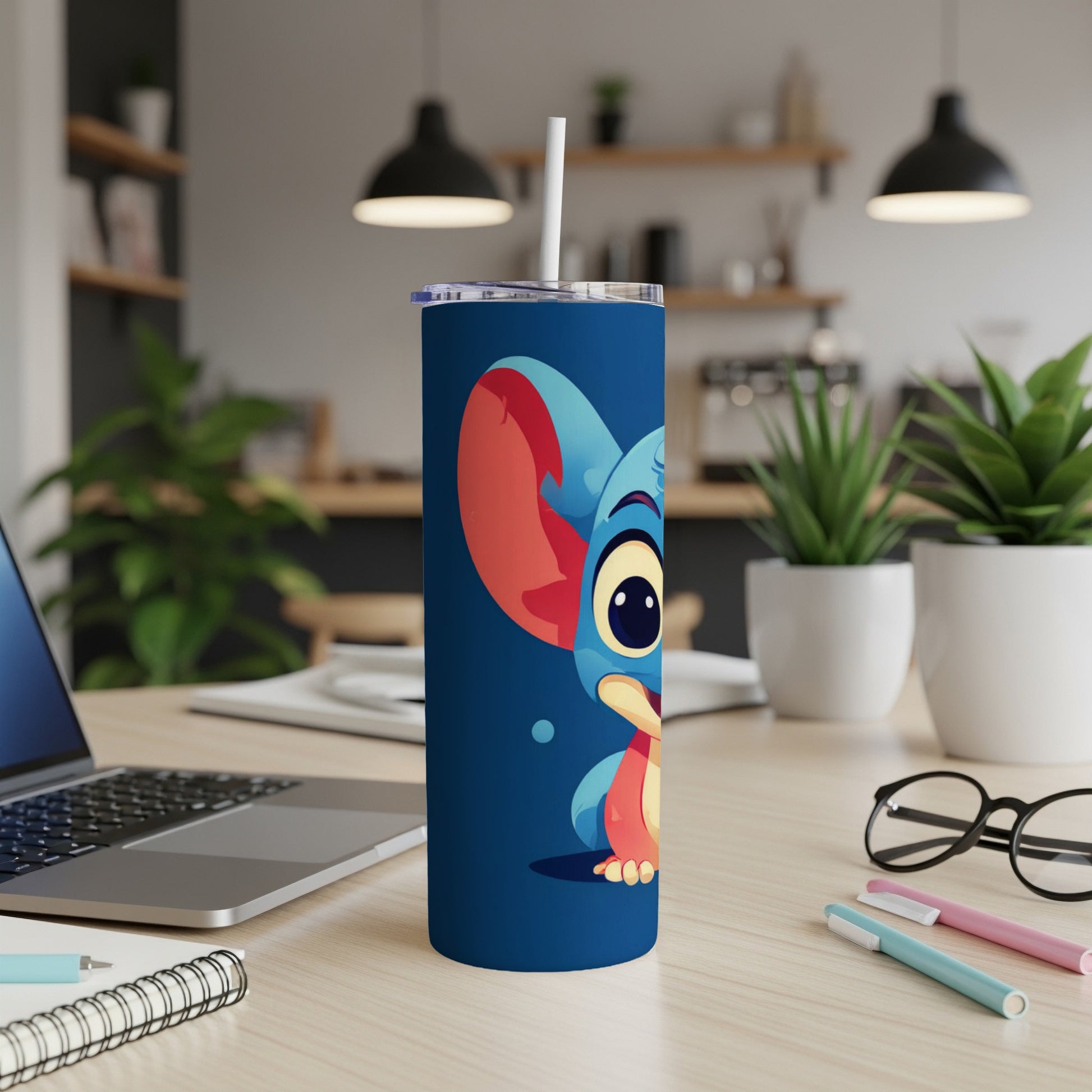 Blue tumbler with Stitch character illustration and white straw.