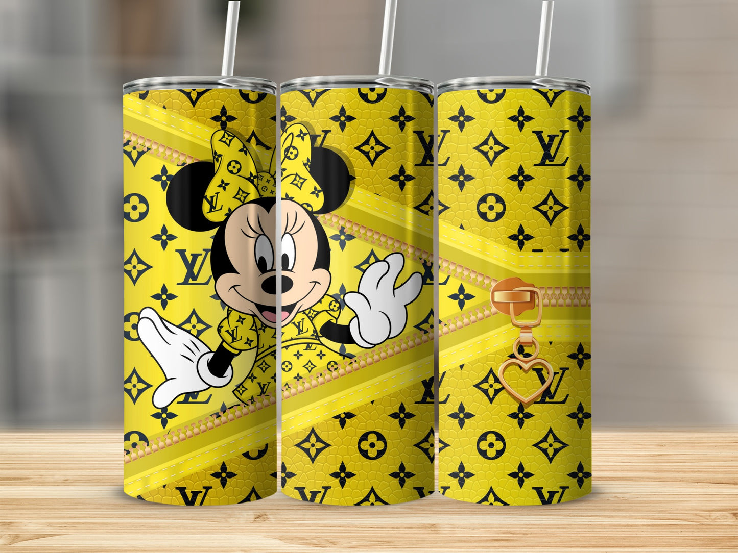 Yellow tumbler with Mickey Mouse and LV pattern, featuring a gold zipper charm.