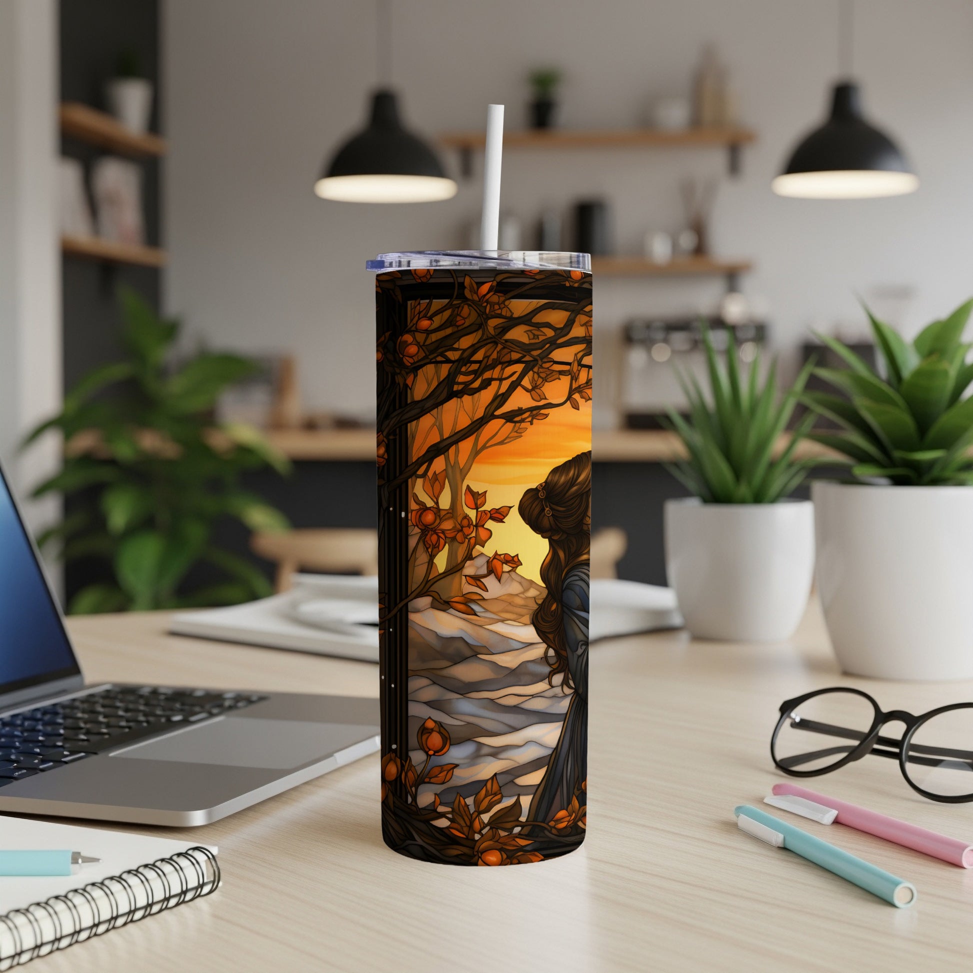 Tumbler with a woman in a dark dress on a path with autumn leaves and sunset.