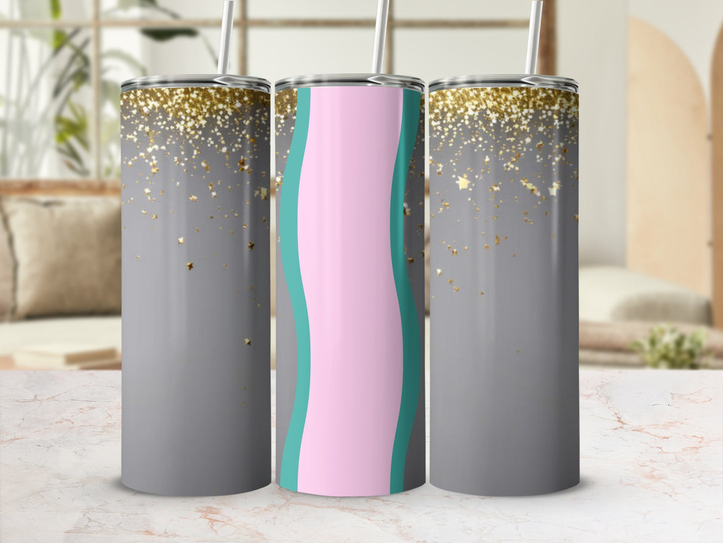 Three gray tumblers with gold glitter and a teal and pink wave design.