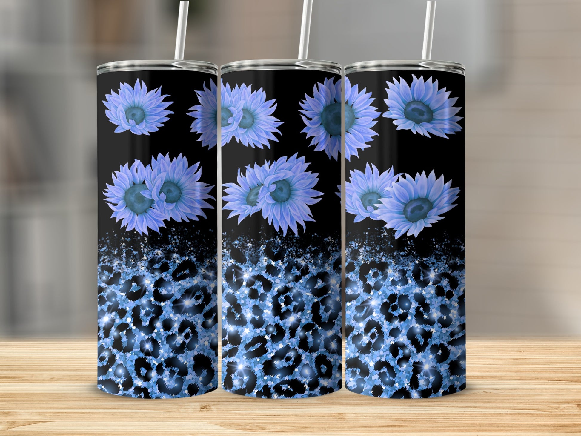 Black tumbler with blue floral and leopard print design.